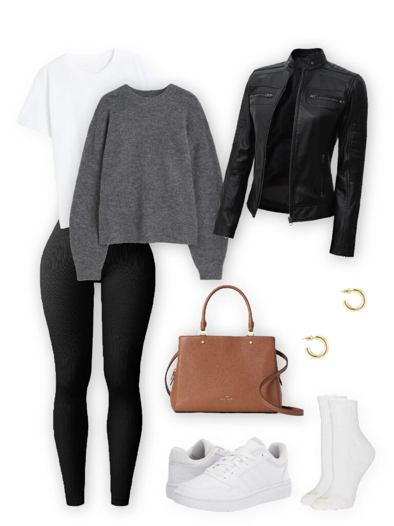 Leather jacket layered over a grey sweater and black leggings, paired with white sneakers, a brown handbag, and gold hoop earrings.